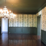 Dining room, freshly redone with tree-pattered wallpaper and dark green wainscoting and a dark green ceiling. Wallpaper and paint completed by Lauro Painting in the Greater Philadelphia area.